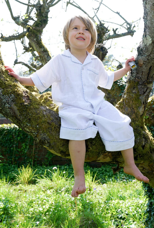 toddler in white cotton pyjamas from TurQuaz