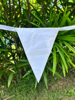 Close up of white flag on Balloo bunting from Turquaz.
