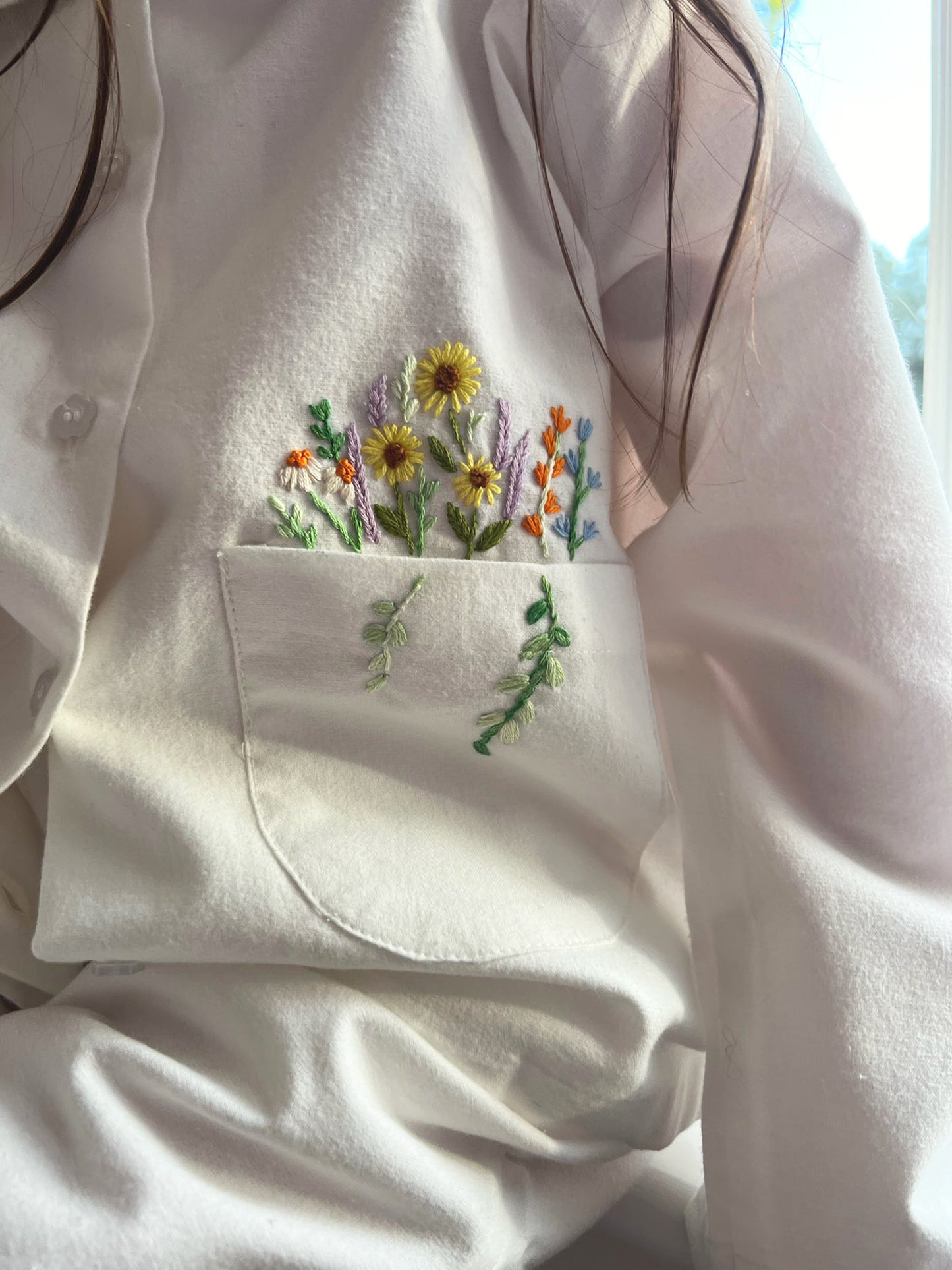 Detail of the hand stitched plants on Flora kids pyjamas by TurQuaz.