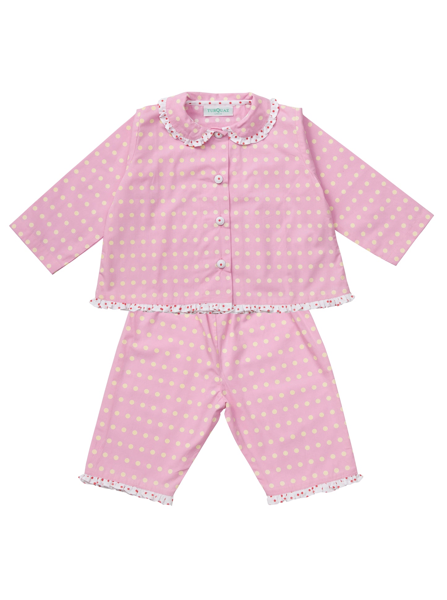 Pink polka-dot children's pyjamas from Turquaz, frilled collar and edging.