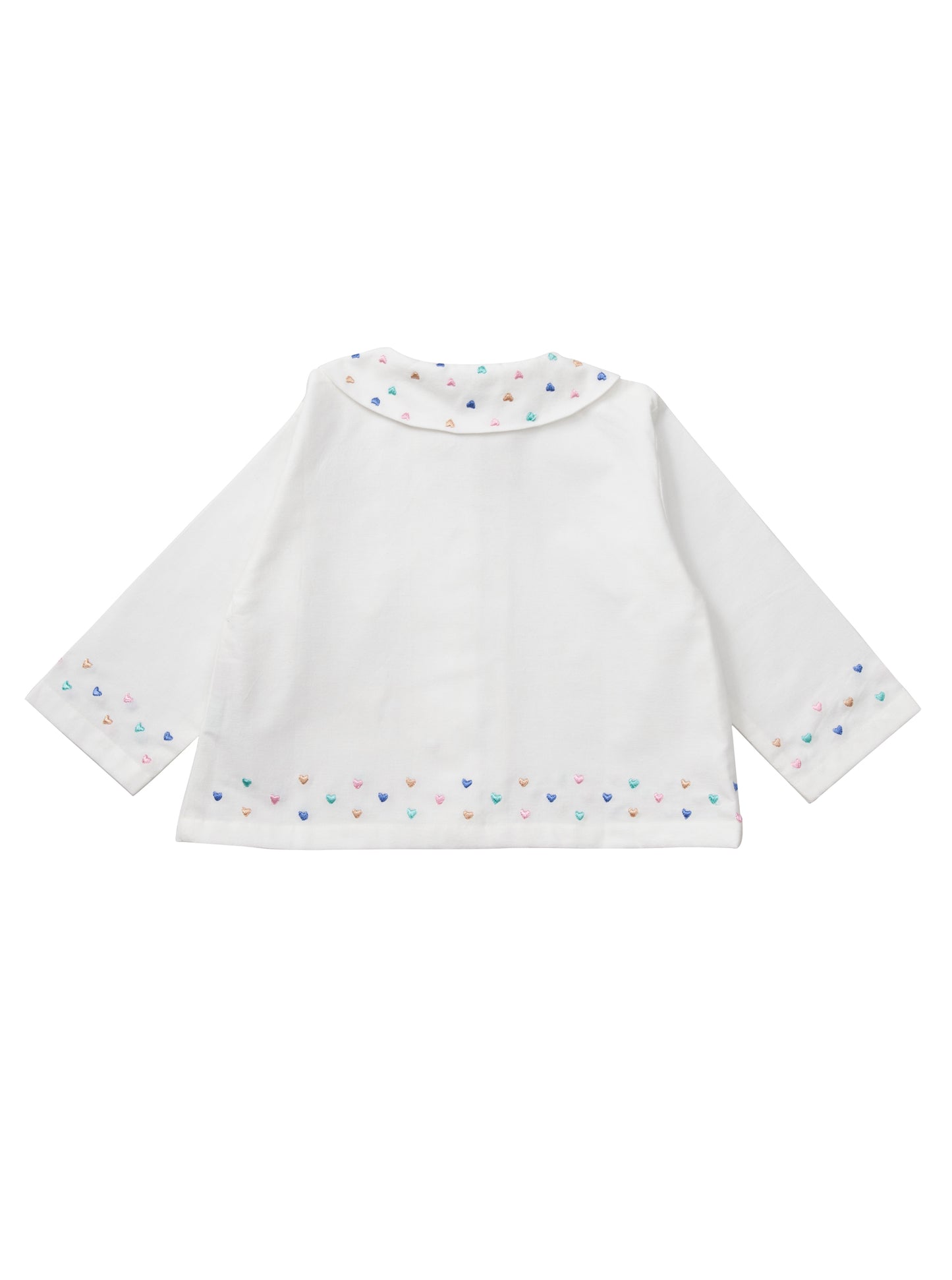 White cotton children's pyjamas with hearts galore. Designed with love by Turquaz.