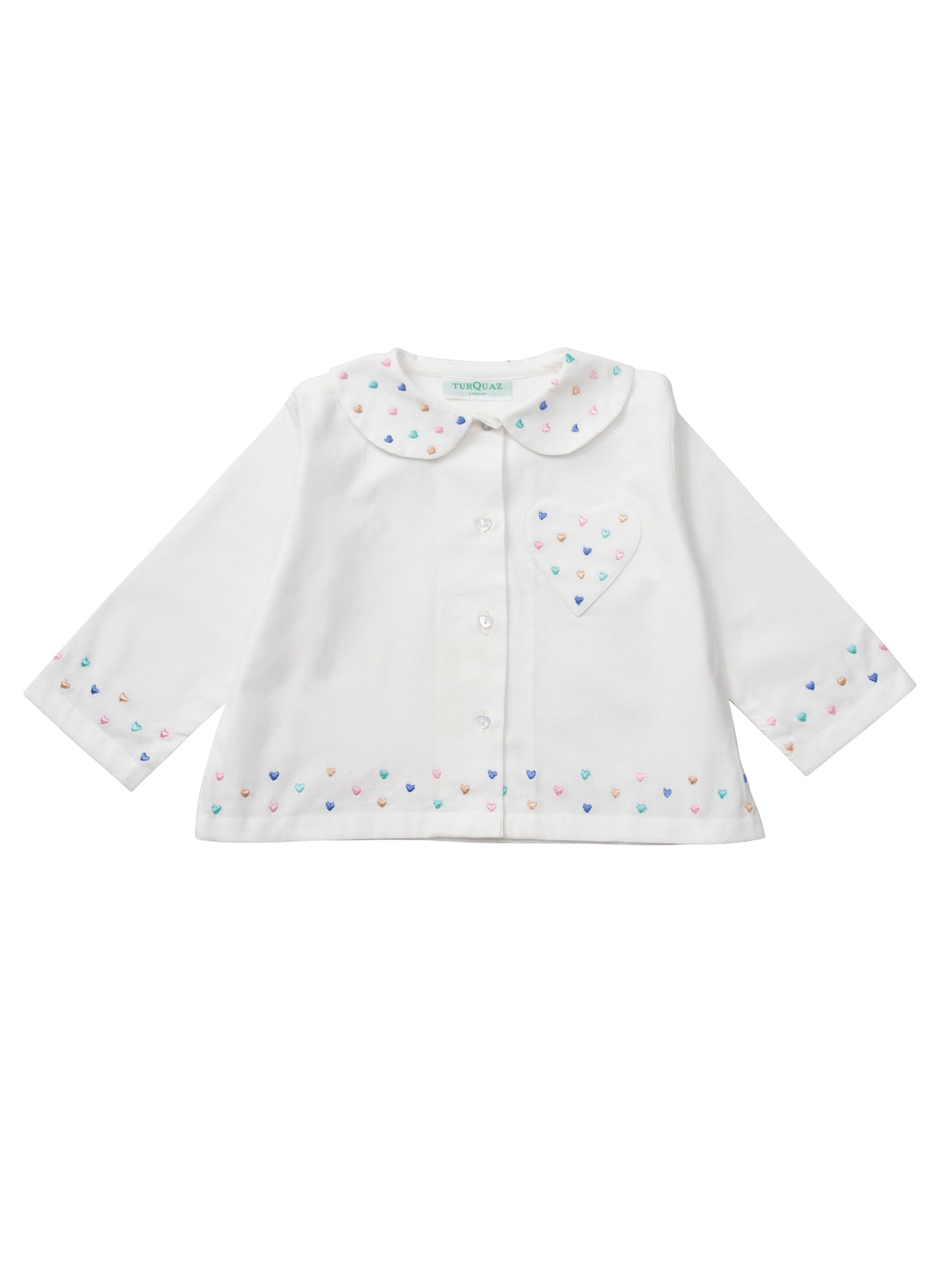 White cotton children's pyjamas with hearts galore. Designed with love by Turquaz.