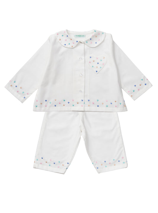 White cotton children's pyjamas with hearts galore. Designed with love by Turquaz.